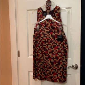Red, burgundy and tan patterned satin skirt set